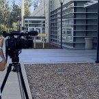 Person filming a fire cadet at the Oxnard College Fire Academy.