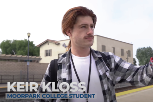 student looking at bus schedule