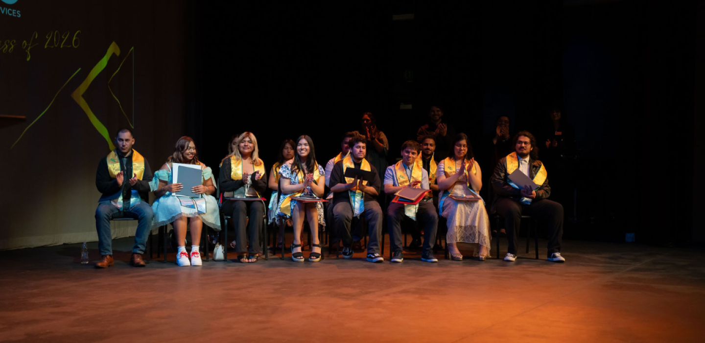 TRIO Class of 2026 graduates on stage