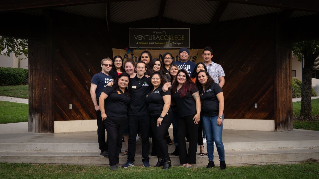 Group of Student government leaders standing in front of small amphitheatre