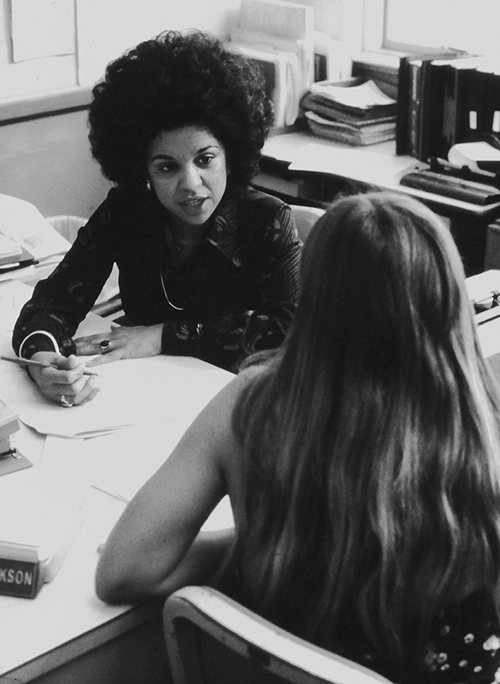 Oxnard College Retro Photo 2 females speaking