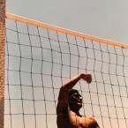 A young Rey Reyes playing volleyball. 