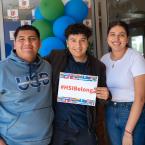 students with #HSIBelong sign