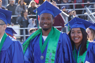 Grads at Oxnard, below photo, text reads: Academic, Explore Academic Offerings and Divisions