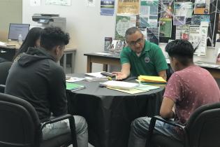 Counselor speak to students on Cash for College Event 