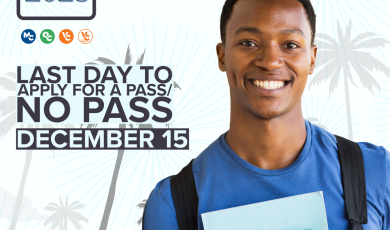 Young black male college student wearing a backpack and hold