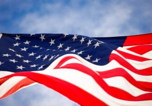 American flag waving in the sky.