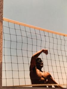 A young Rey Reyes playing volleyball. 