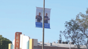 Light pole banners on Oxnard Boulevard in Oxnard featuring two Oxnard College graduates.