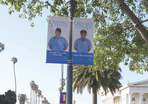 Light pole banners on C Street in Oxnard featuring two Oxnard College Public Safety graduates.